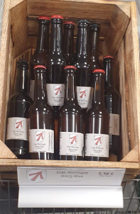 Holzkiste mit Flaschen Roringer Berg-Bier im Laden